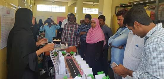 Students presenting models at the Science Exhibition